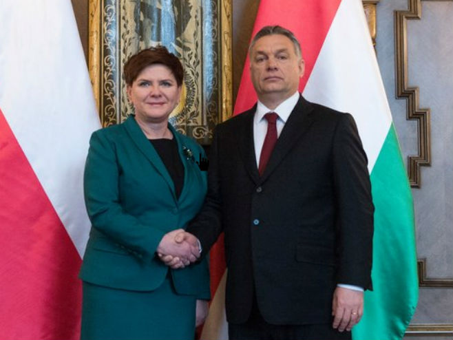 Виктор Орбан и Беата Шидло (фото: Twitter @PremierRP_en) - 