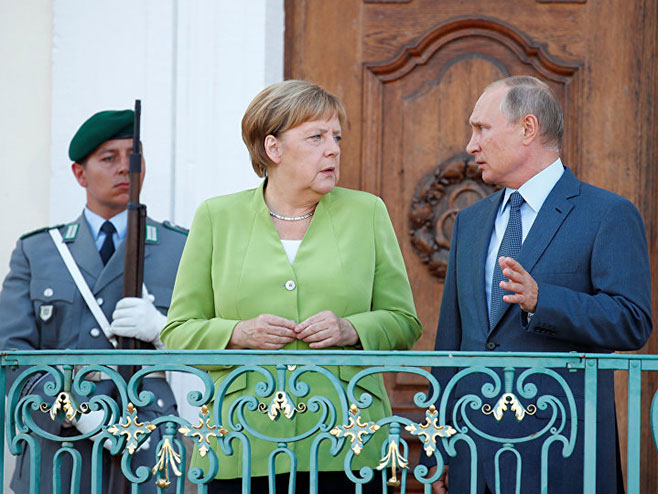Ангела Меркел и Владимир Путин (Фото: rs-lat.sputniknews.com) - 