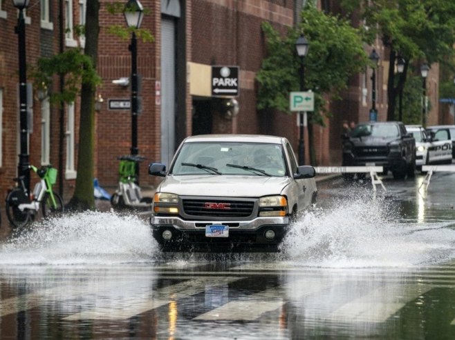 Киша у Вашингтону (Фото: илустрација/EPA/SHAWN THEW) Киша у Вашингтону (Фото: илустрација/EPA/SHAWN THEW) -