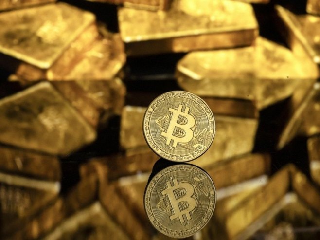 Биткоин (фото: EPA/PABLO GIANINAZZI) Биткоин (фото: EPA/PABLO GIANINAZZI) -