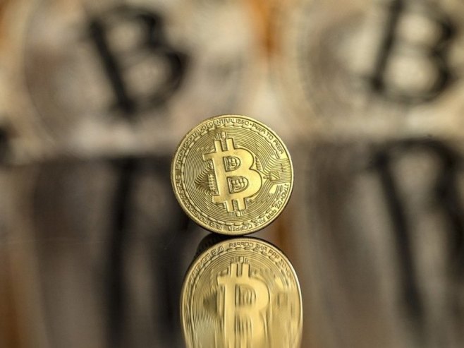 Биткоин (Фото: EPA/PABLO GIANINAZZI, илустрација) Биткоин (Фото: EPA/PABLO GIANINAZZI, илустрација) -