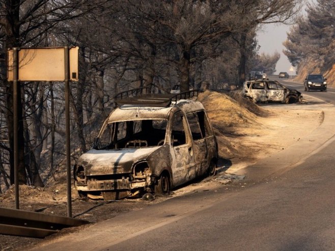 Посљедице пожара у Омишу (Фото: EPA/STRINGER) Посљедице пожара у Омишу (Фото: EPA/STRINGER) -
