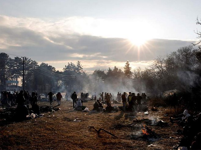 Мигранти (фото:kathimerini.gr) - 