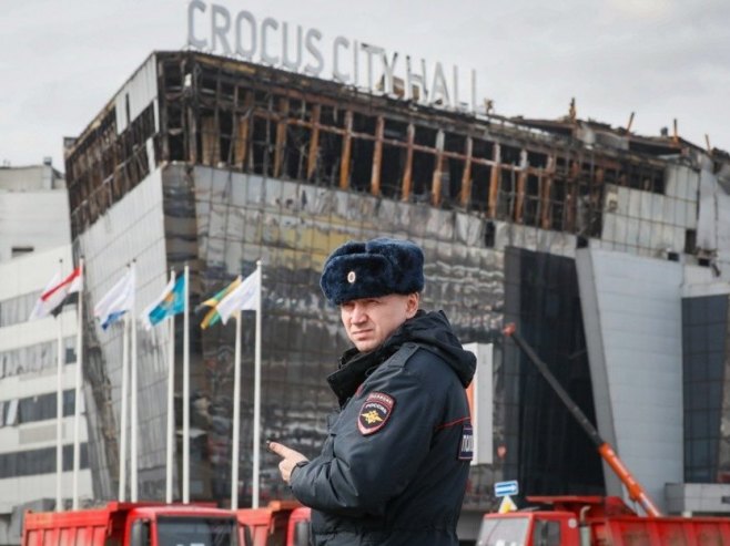 Напад на "Крокус сити хол" (Фото: EPA-EFE/YURI KOCHETKOV) - 