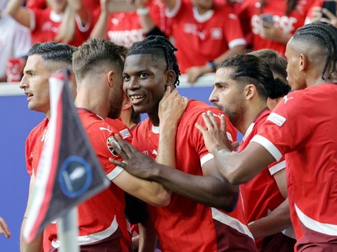 Радост фудбалера Швајцарске (Фото: EPA-EFE/RONALD WITTEK) 