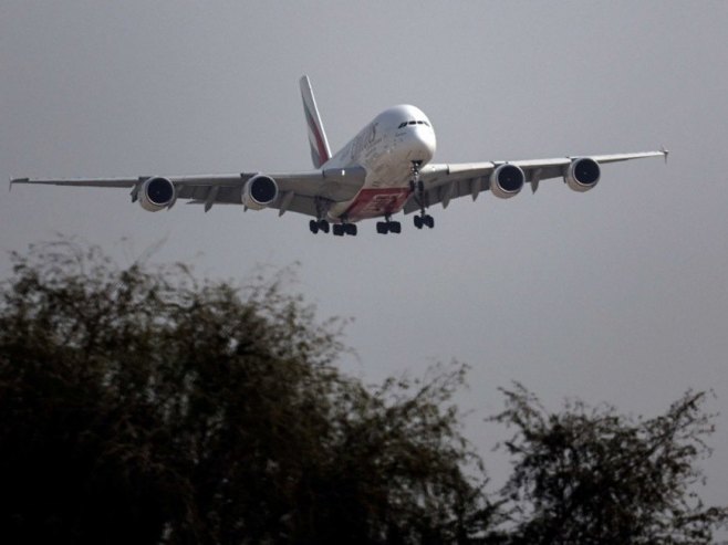 Авион из Дохе са 250 српских држављана слетио у Београд Авион из Дохе са 250 српских држављана слетио у Београд